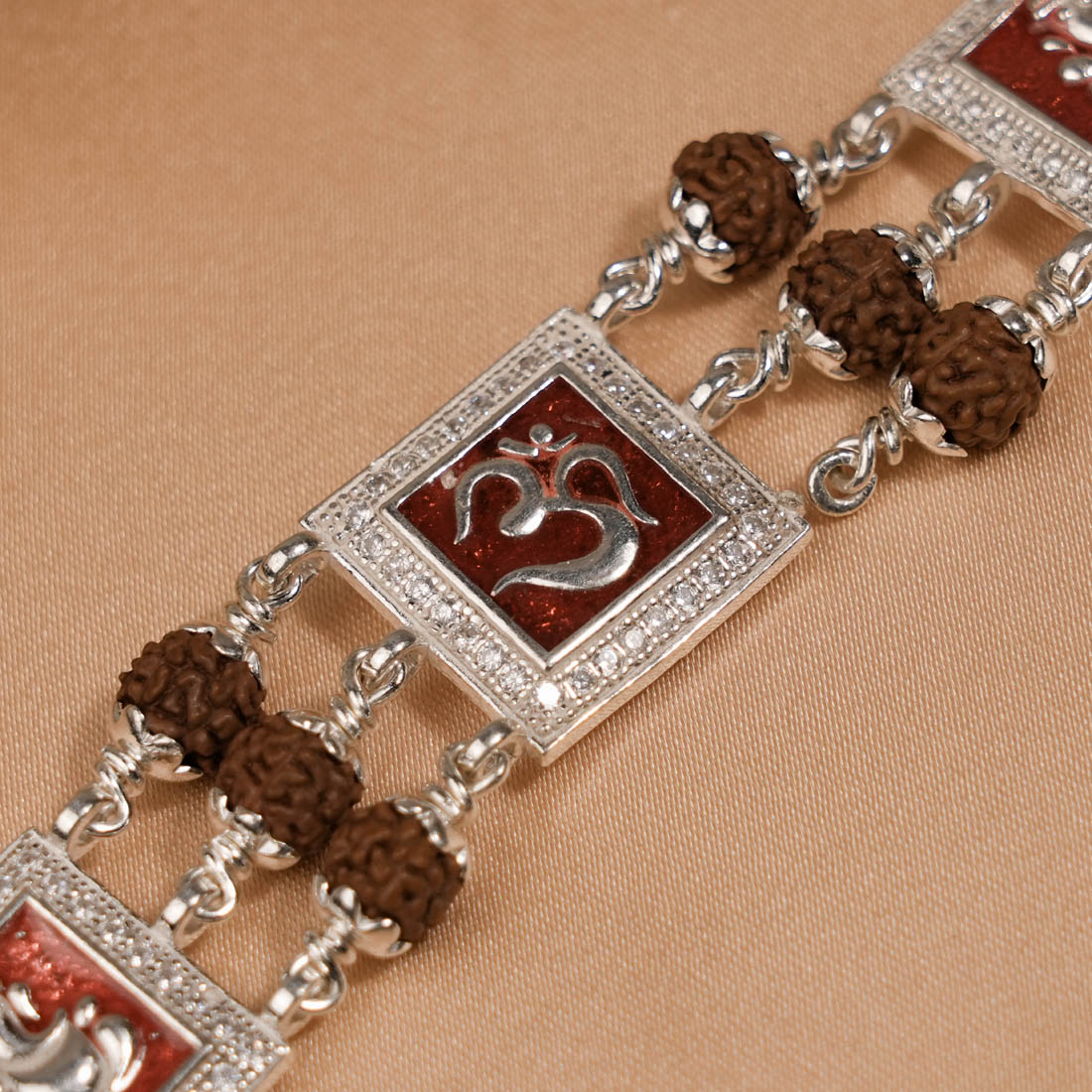 Rudraksha Silver Om with Ganesh Triple Line Bracelet