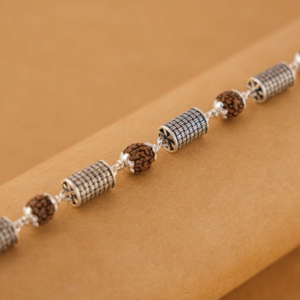 Rudraksha and Hollow Cylindrical Silver Beads Bracelet