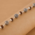 Rudraksha Silver Hollow Round Beads Bracelet.