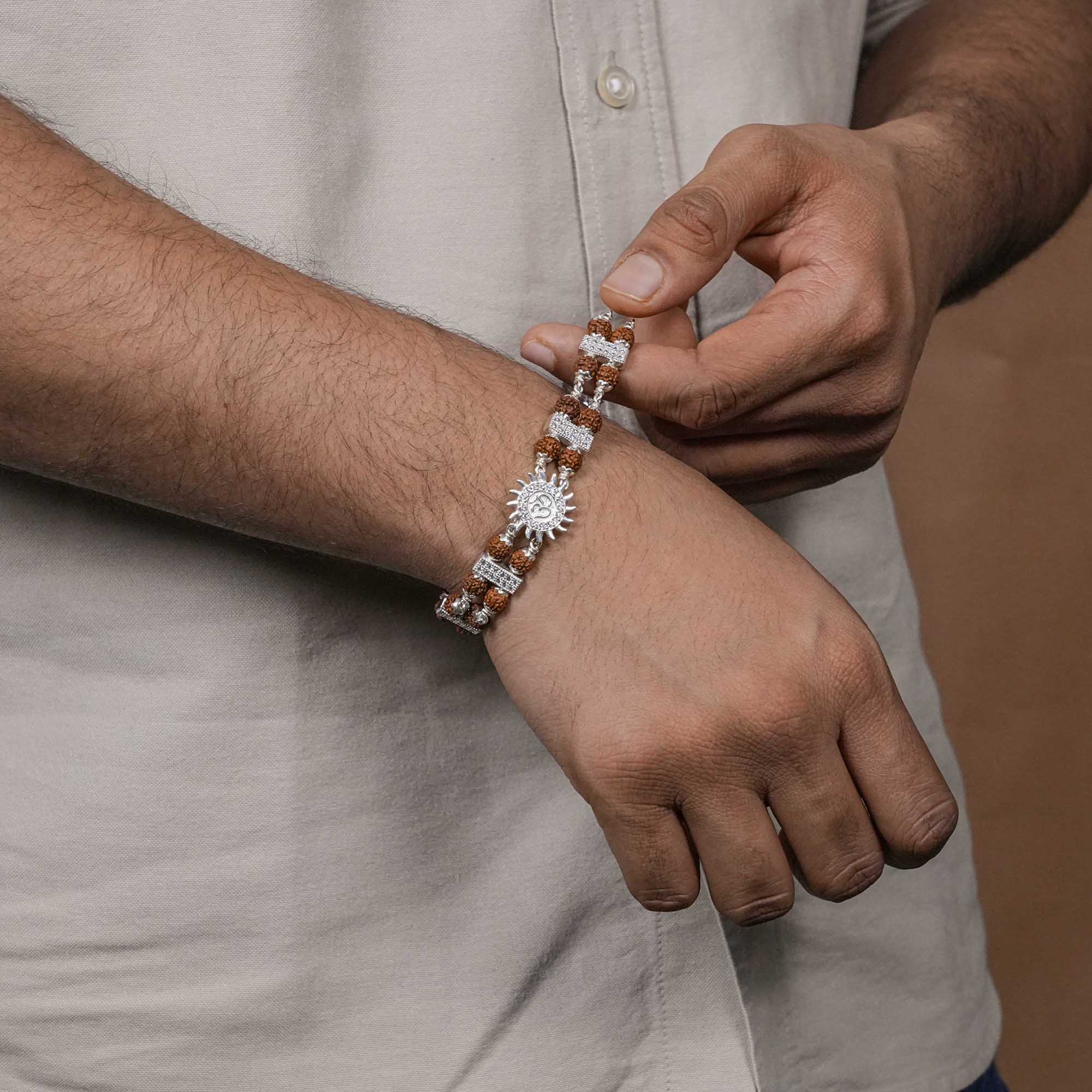 Orignal Rudraksha Silver Bracelet with Om Embedded in Surya Double Line