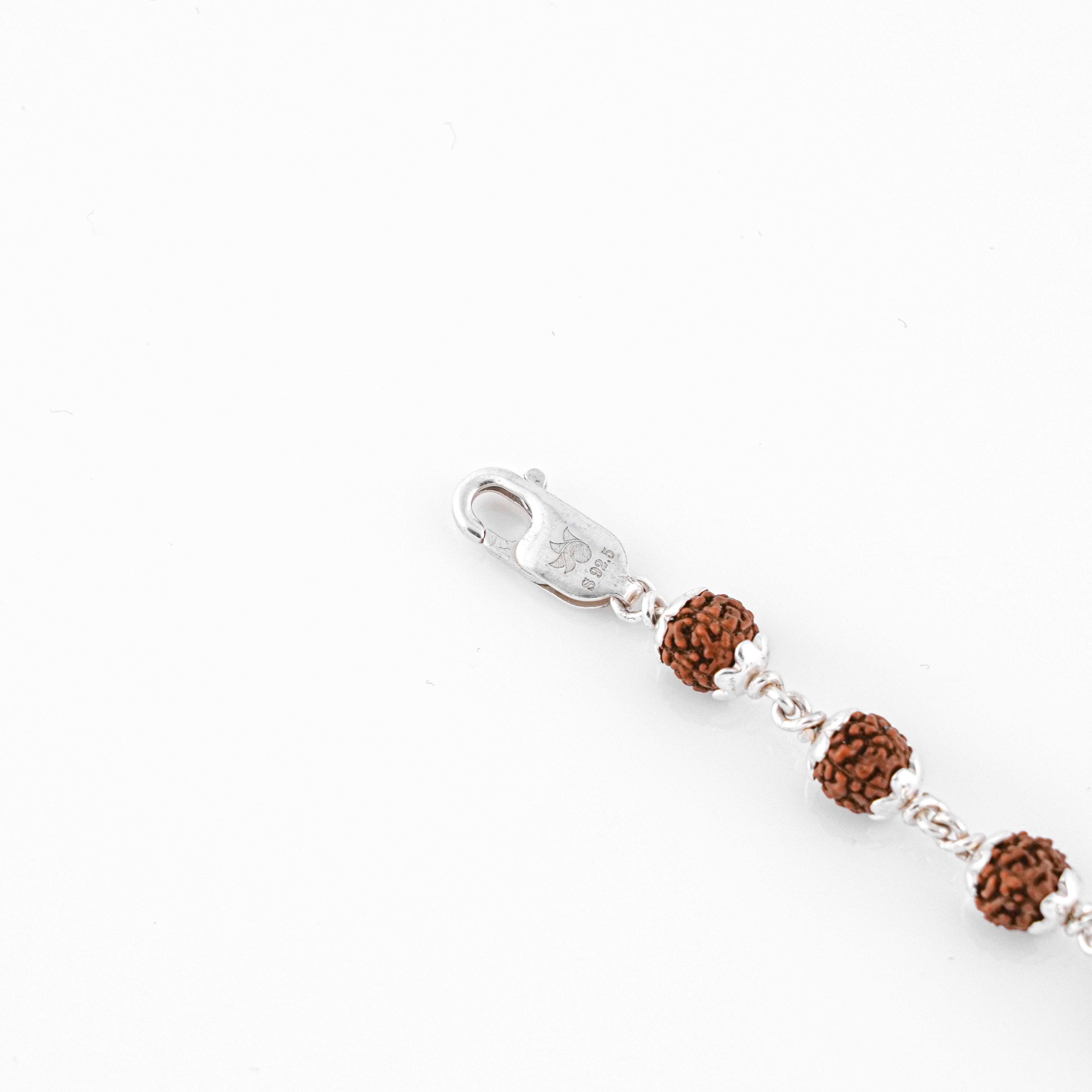 Silver Rakhi with Suryadev and Rudraksha