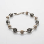 Tulsi With Silver Oval Om Beads Bracelet