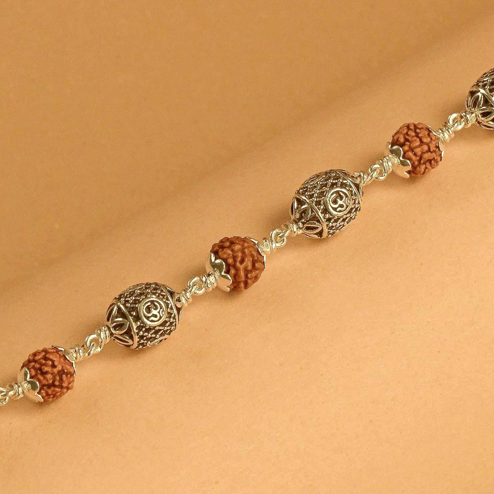 Rudraksha with Oval Om Silver Beads Bracelet