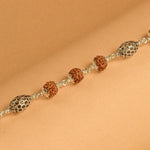 Rudraksha Bracelet with Hollow Oval Silver Beads