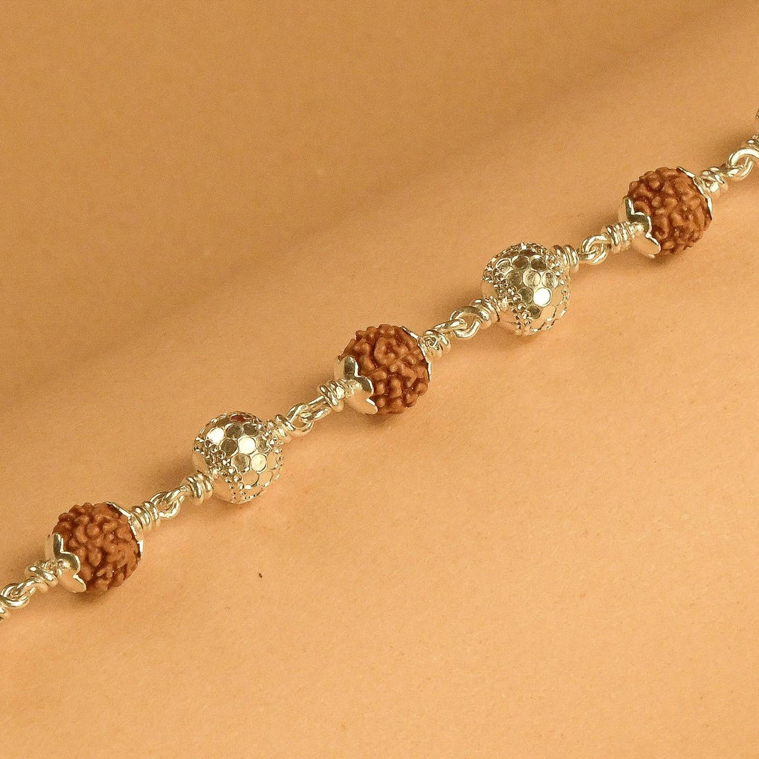Rudraksha Bracelet with Textured CNC Silver Beads