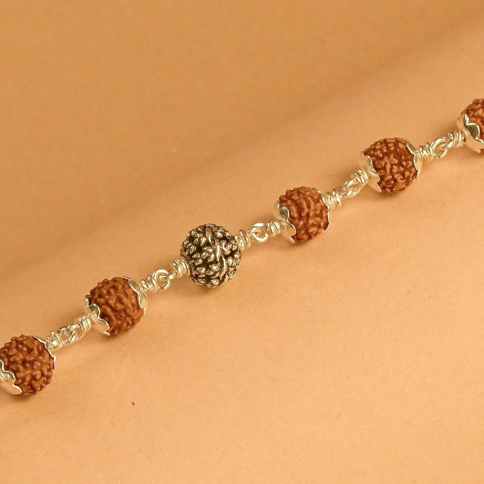 Rudraksha With Silver Flower Beads Bracelet