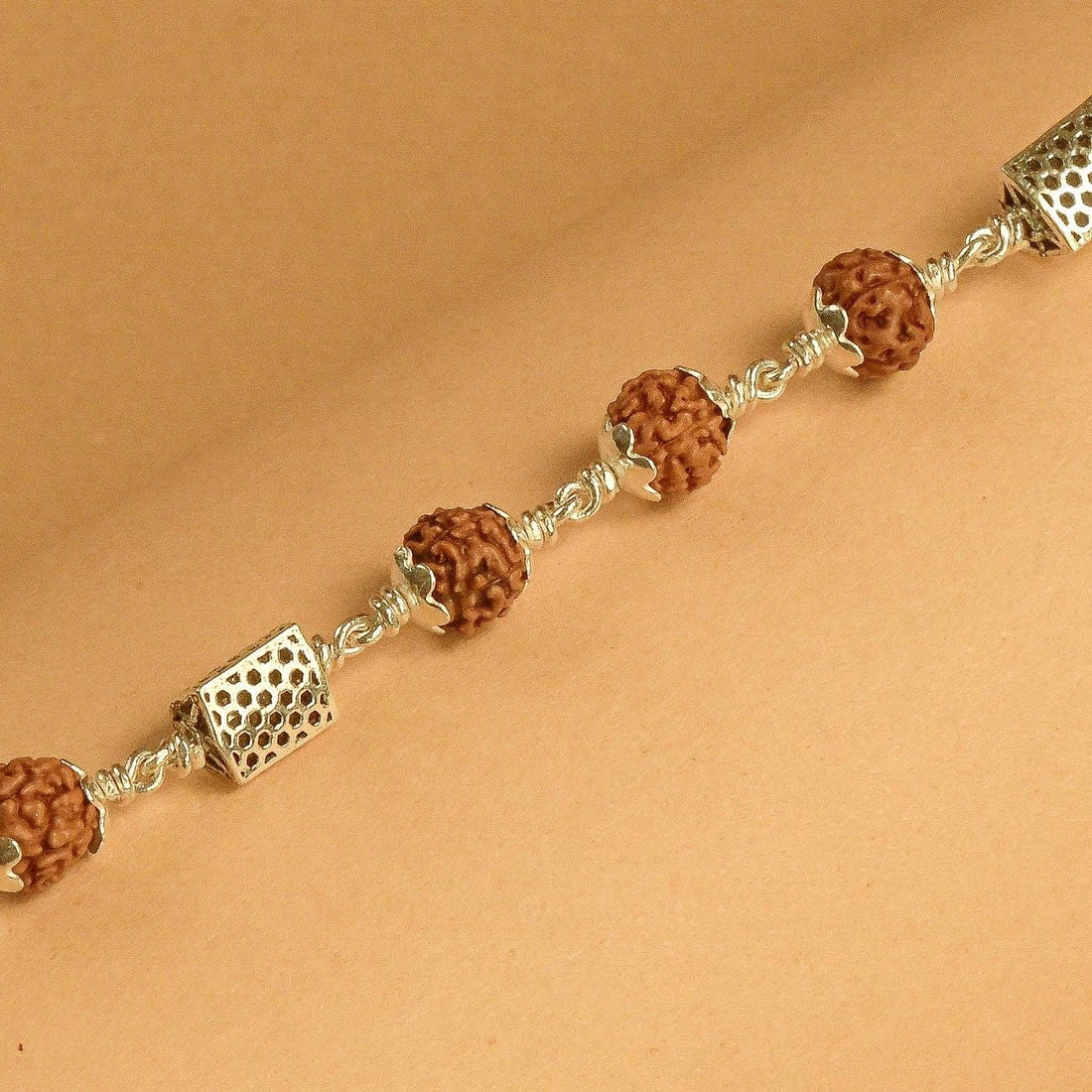 Rudraksha Bracelet with Triangle Silver Beads