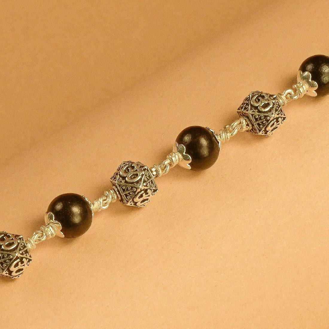 Karungali With Hexagone Om Beads Silver Bracelet