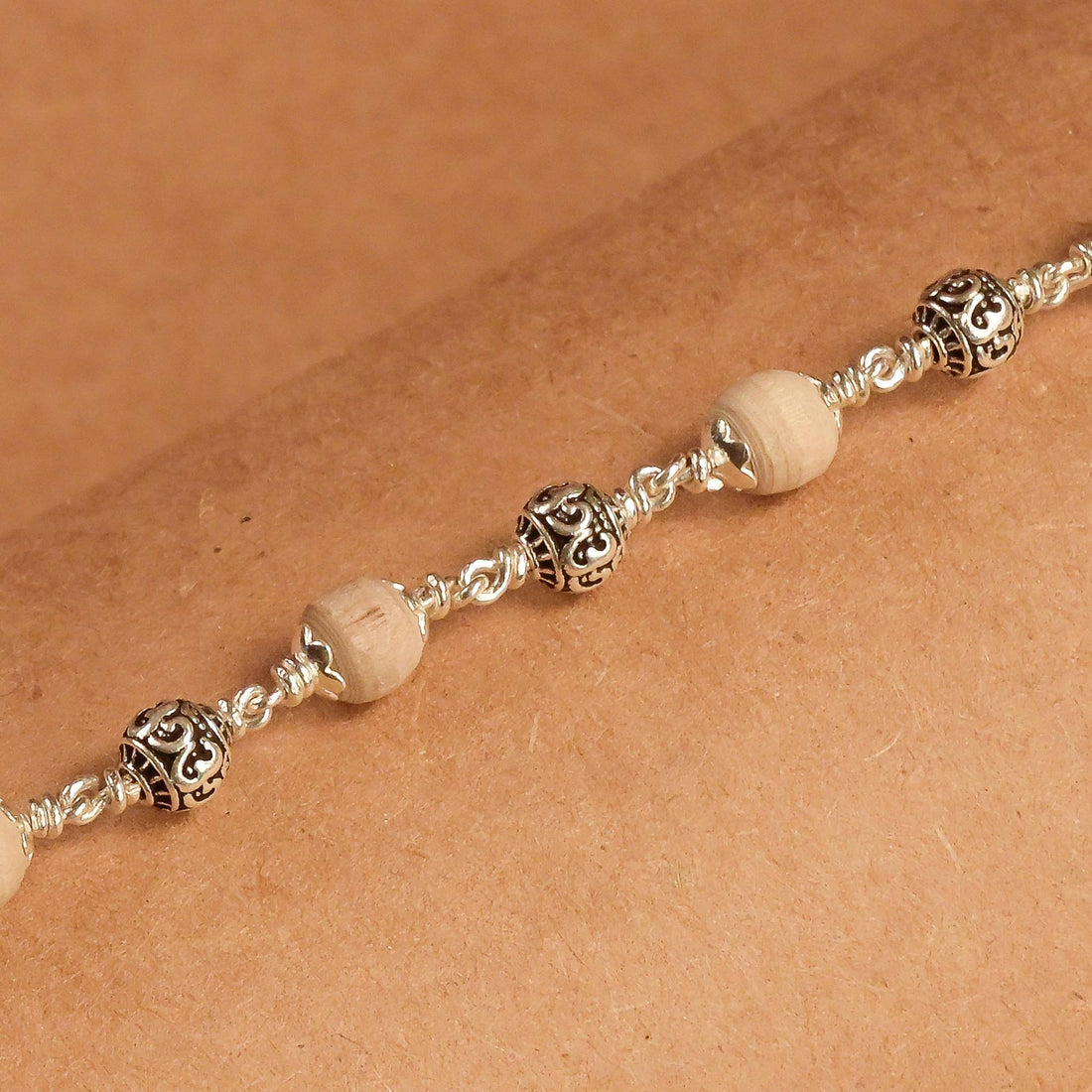 5-6  MM Tulsi With Silver Om Beads Bracelet