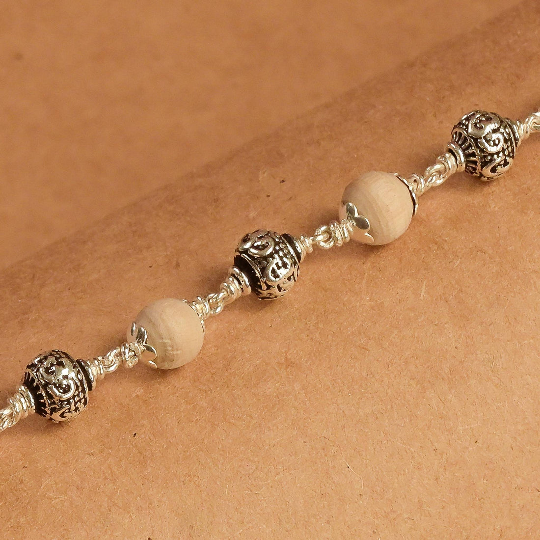 Tulsi Silver Om Beads Bracelet