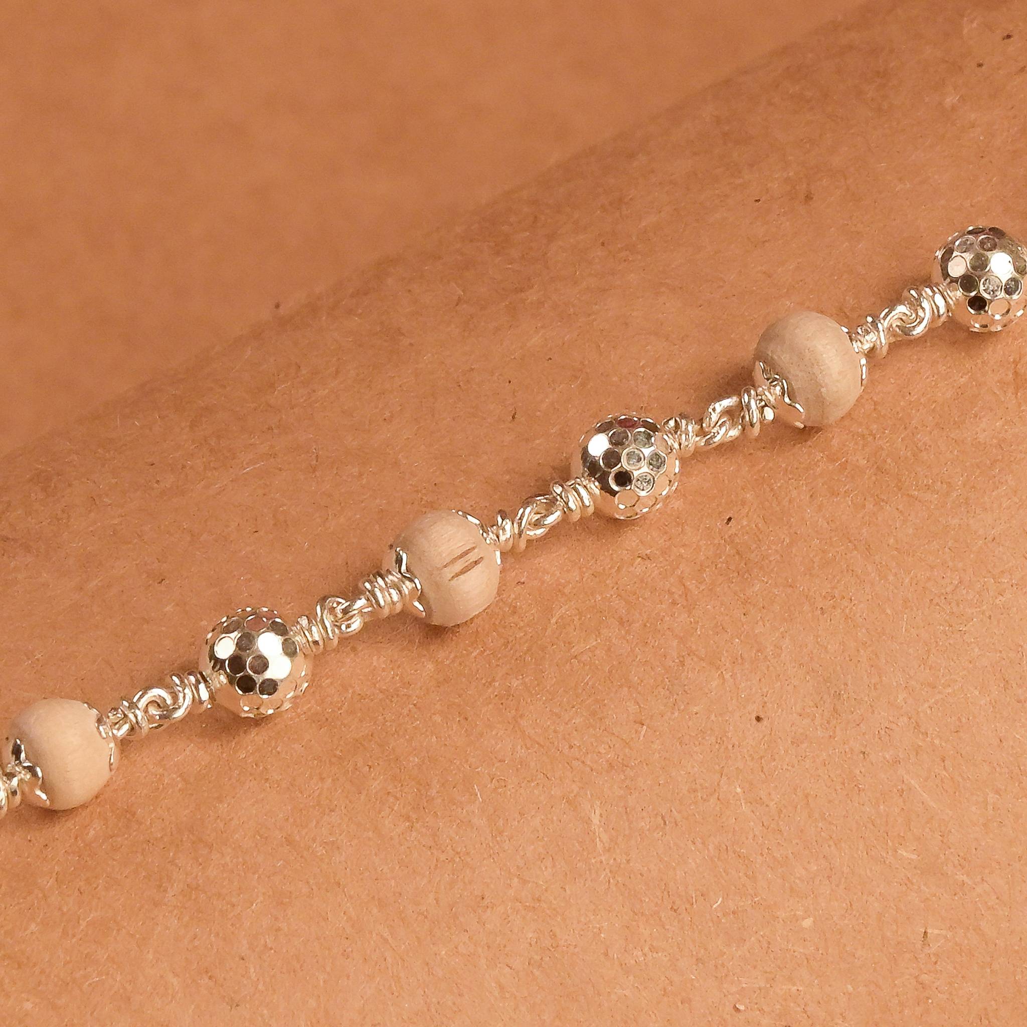 Tulsi With CNC Silver Beads Bracelet