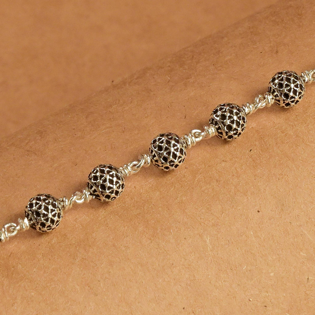 Hollow Round Silver Beads Bracelet.