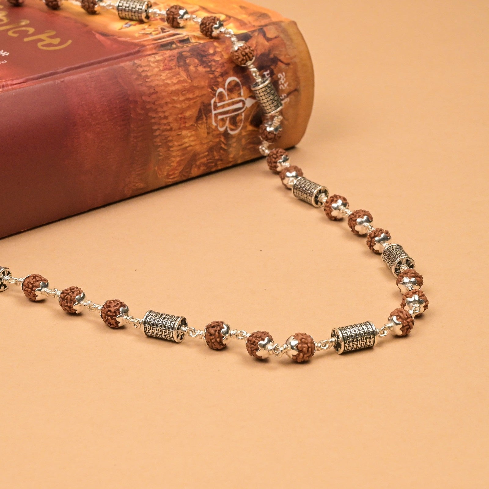 Rudraksha With Cylindrical Silver Beads Mala