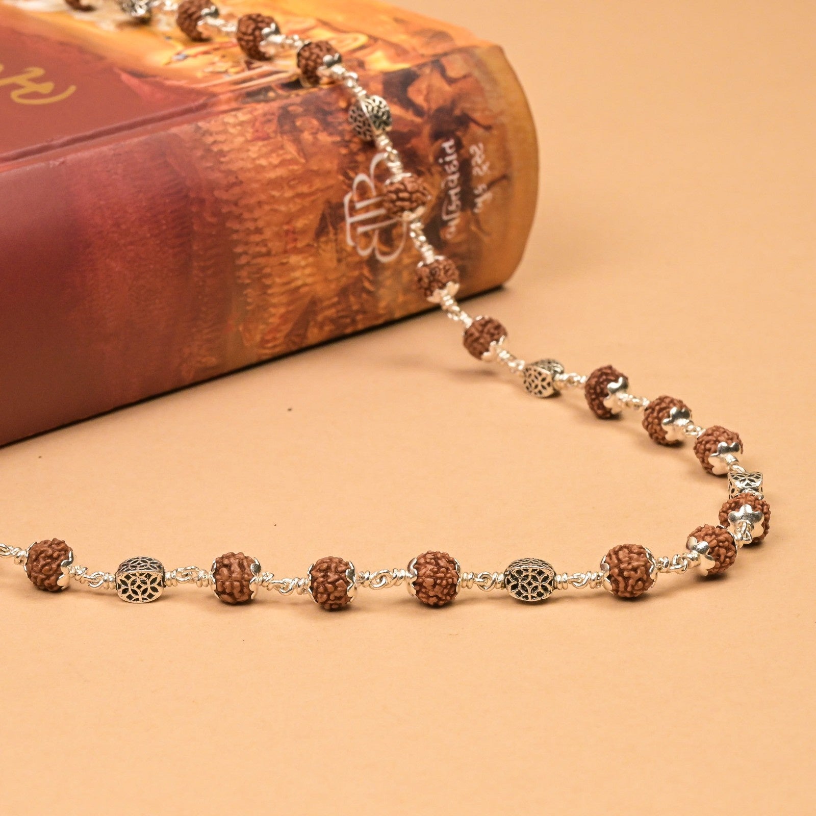 Rudraksha With Hollow Circular Silver Beads Mala