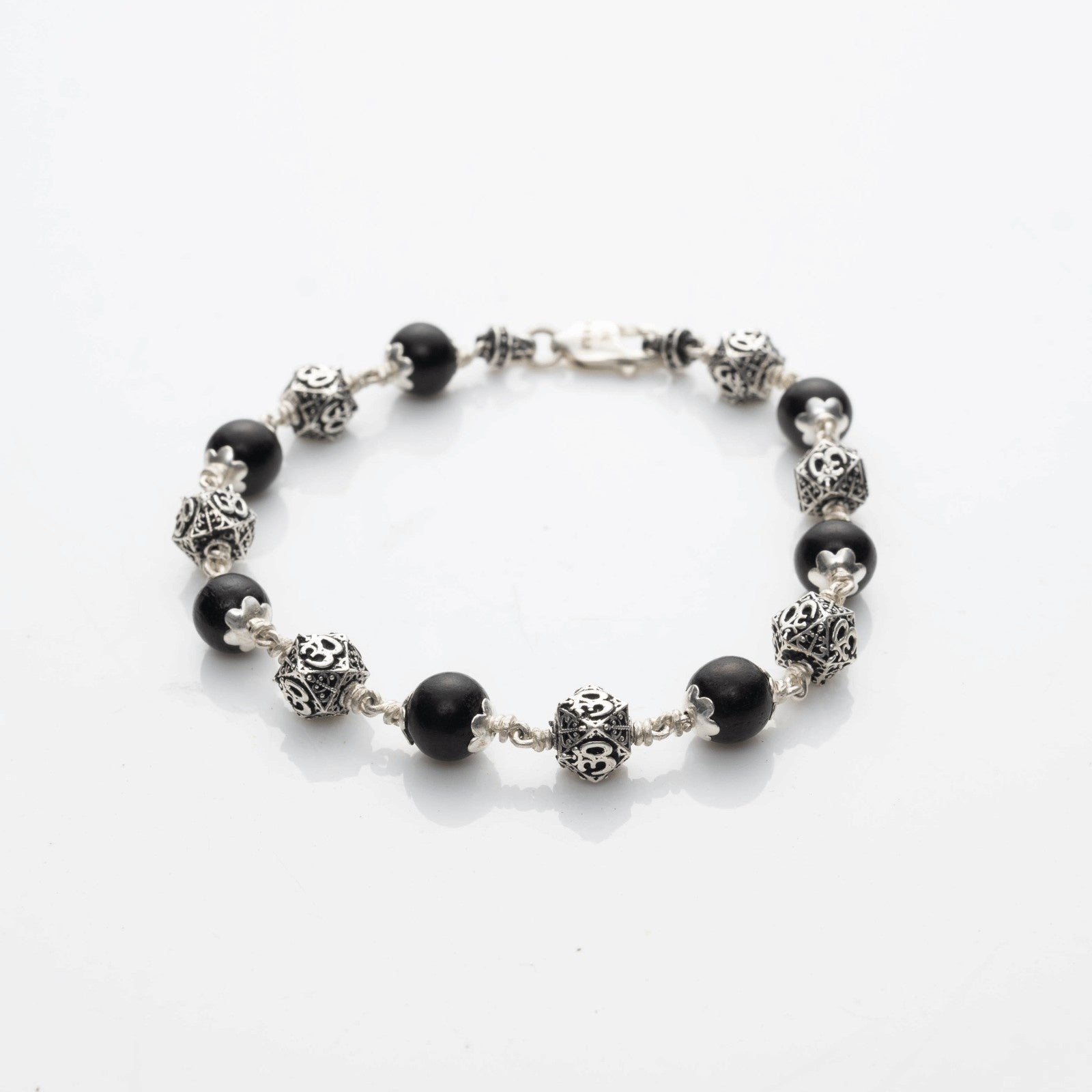 Karungali With Hexagone Om Beads Silver Bracelet