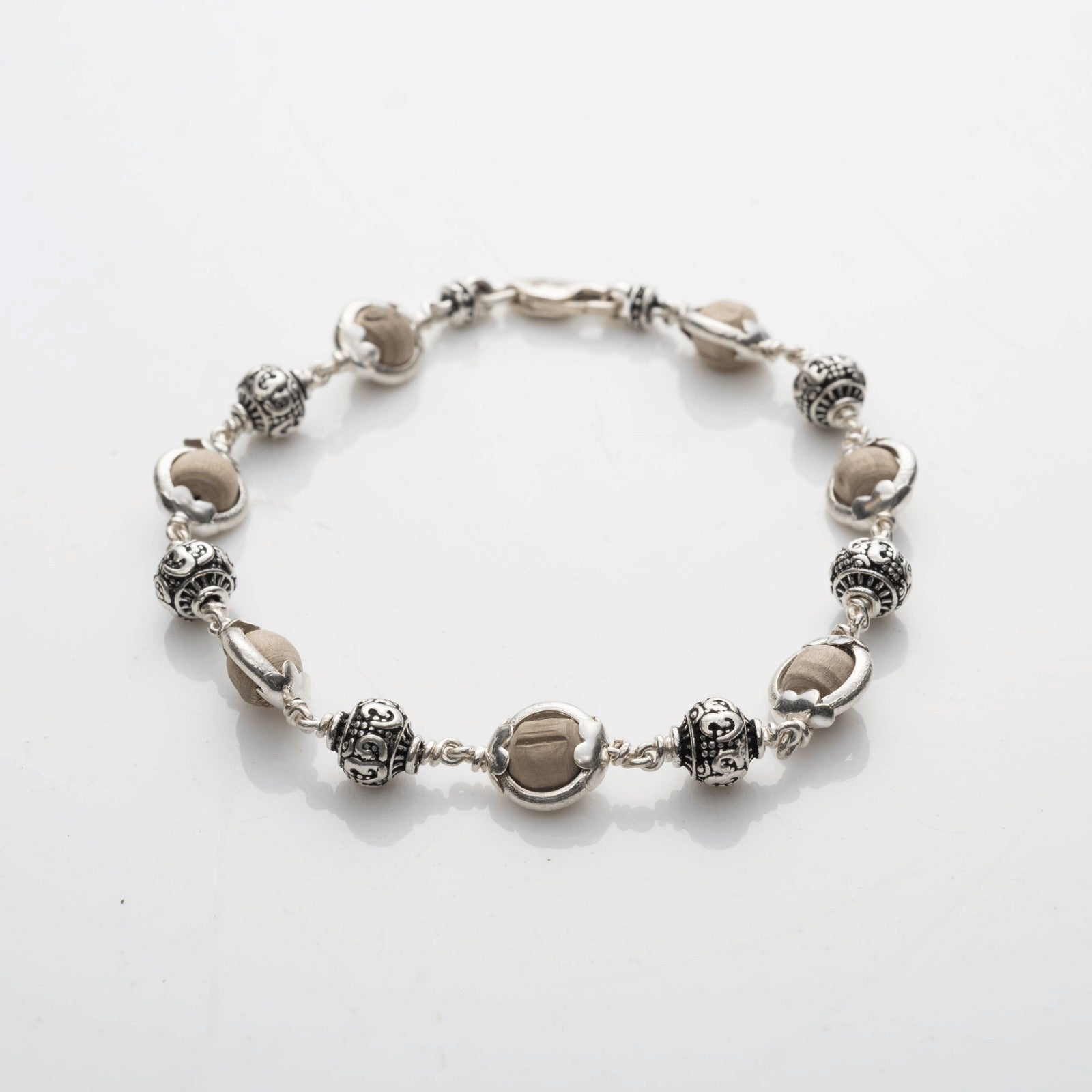 Tulsi Capping With Om Silver Bead Bracelet
