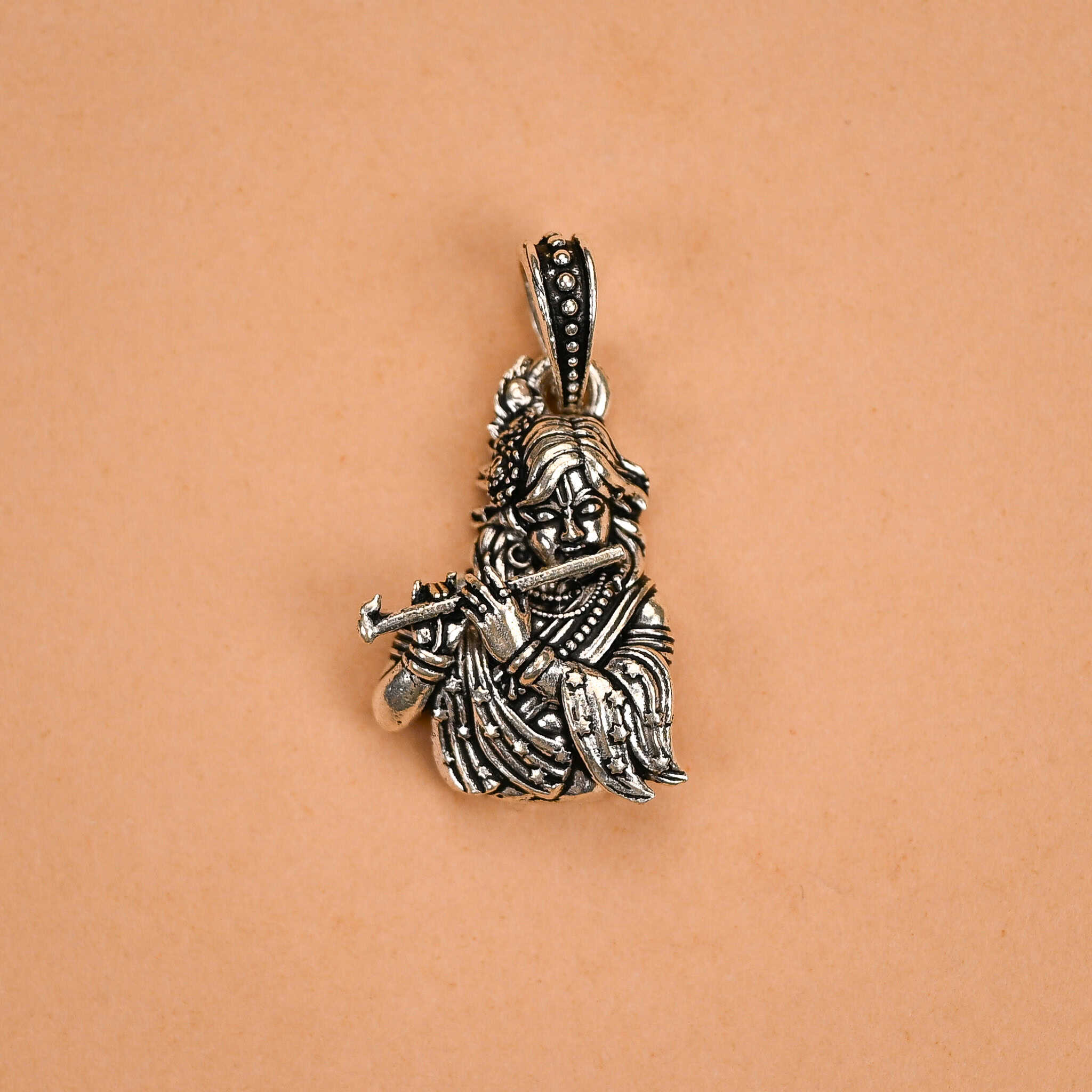 Lord Krishna bansuri silver pendant