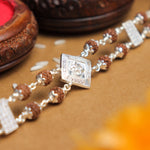 Pure Silver Rakhi with Rudraksha, Om Brooch, Double Line Bracelet
