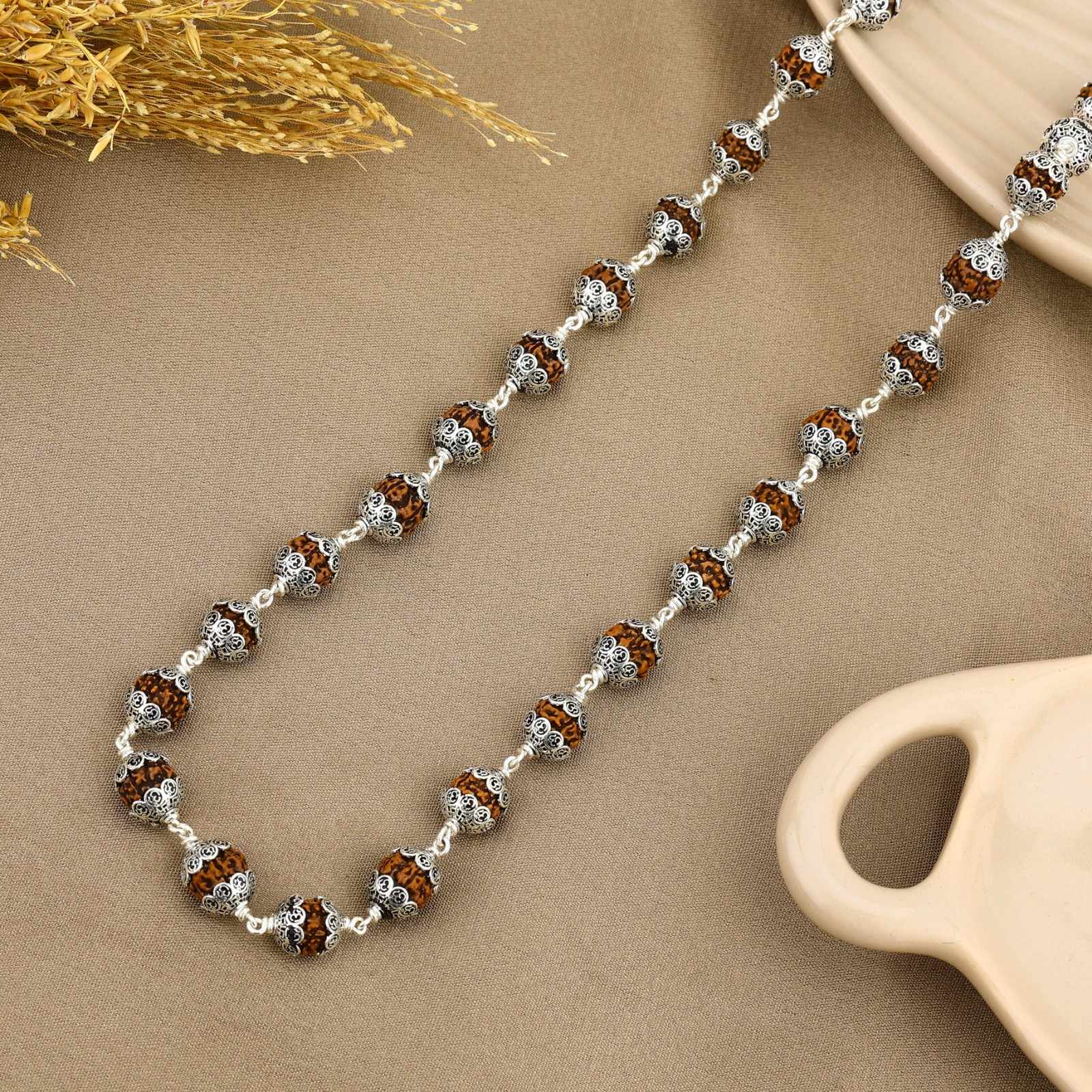 Om Cap Silver Rudraksha Mala
