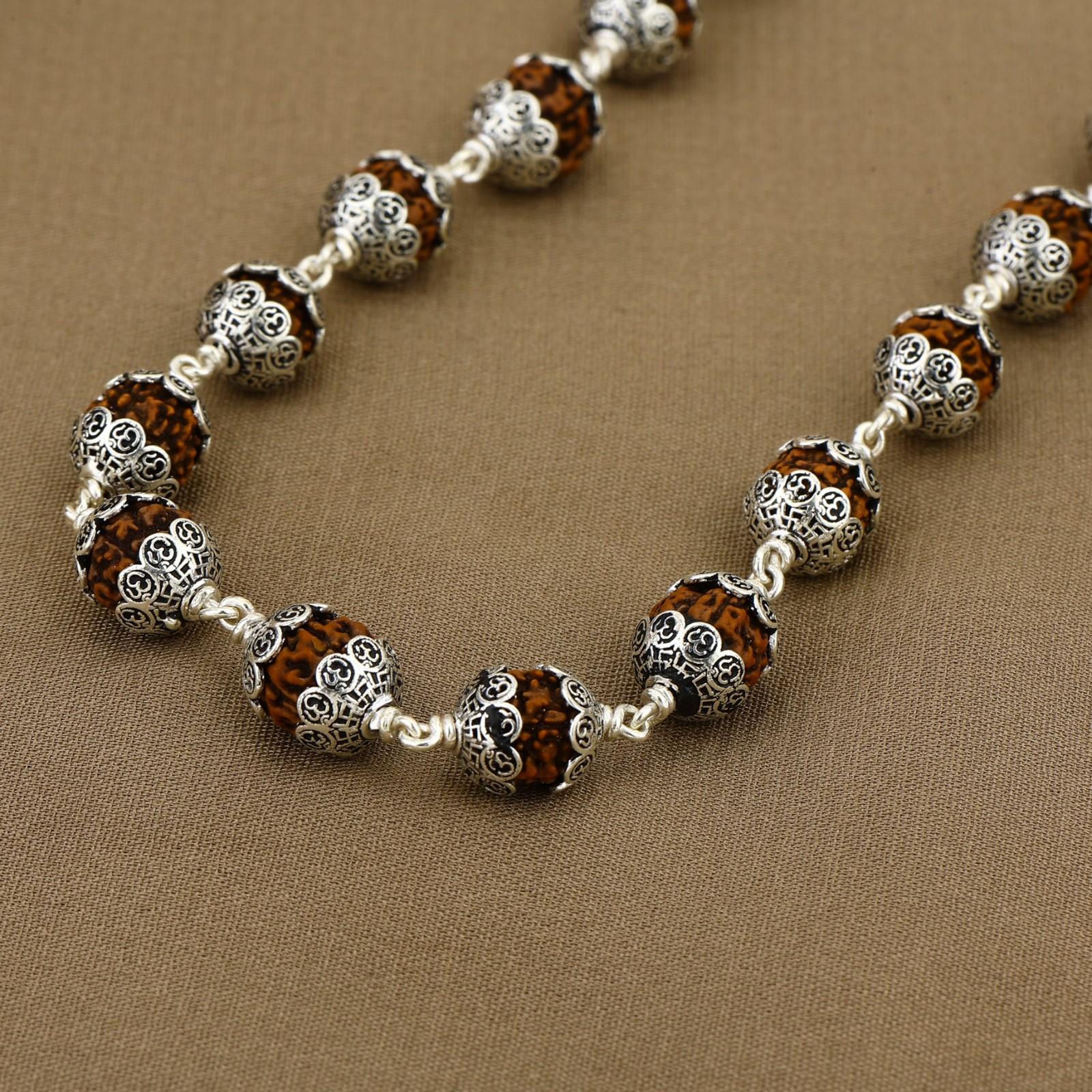 Rudraksha with Om Cap Silver Mala