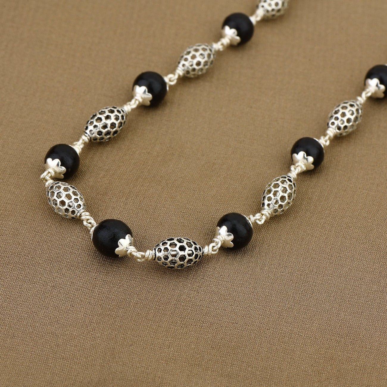 Karungali Silver Mala (Perforated Oval Beads)