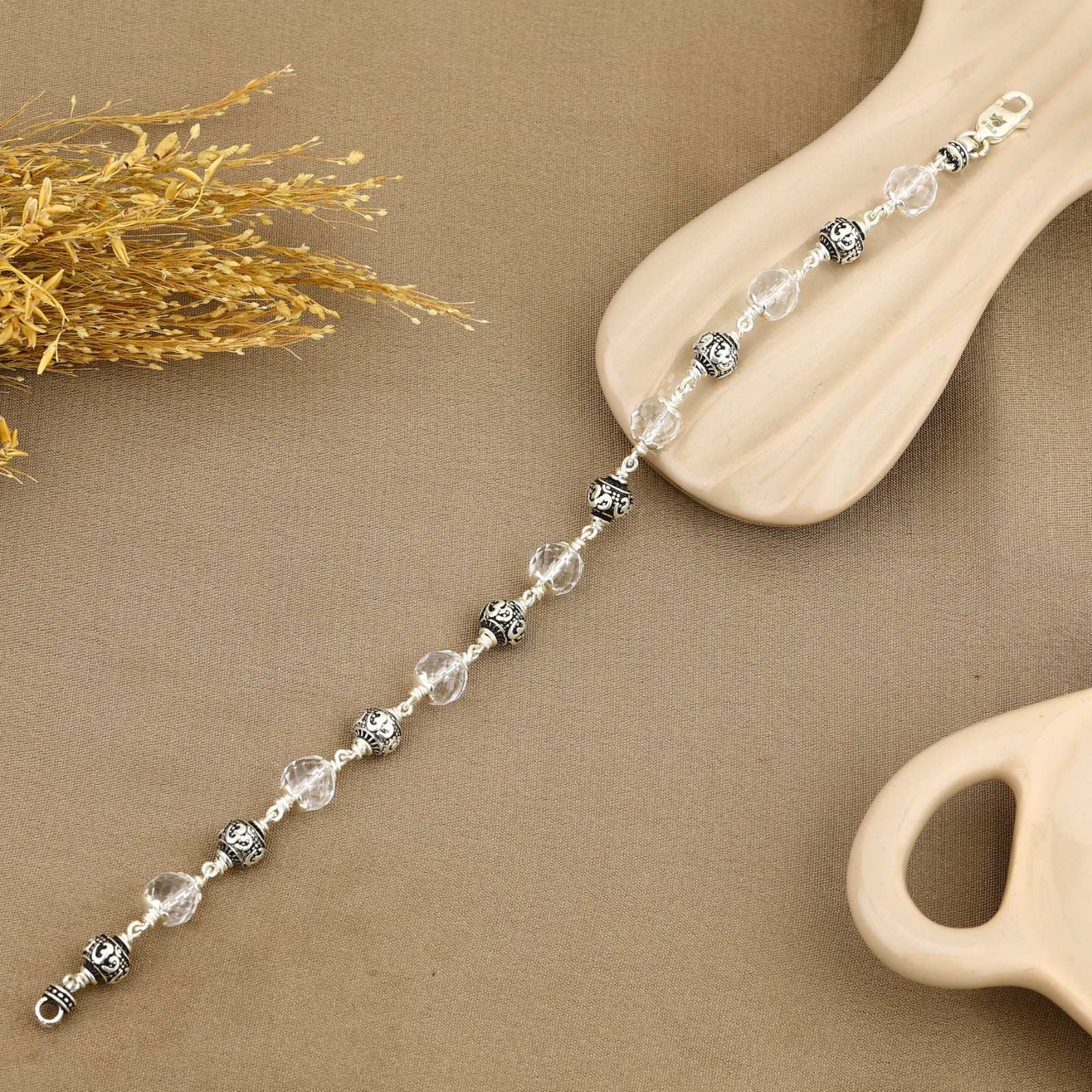 Sphatik Diamond Cut Beads With Om Silver Beads Bracelet