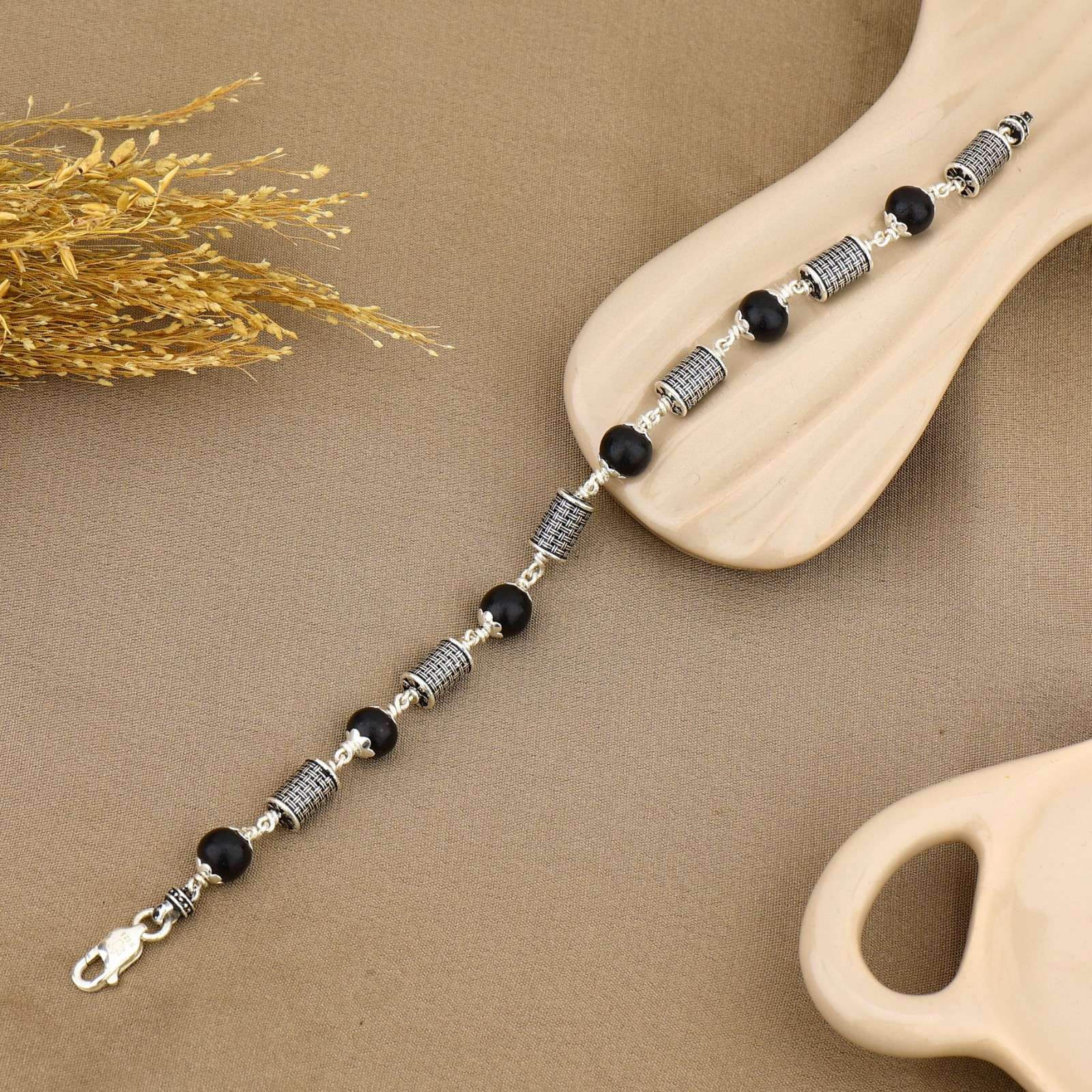 Karungali with Hollow Cylindrical Silver Bracelet