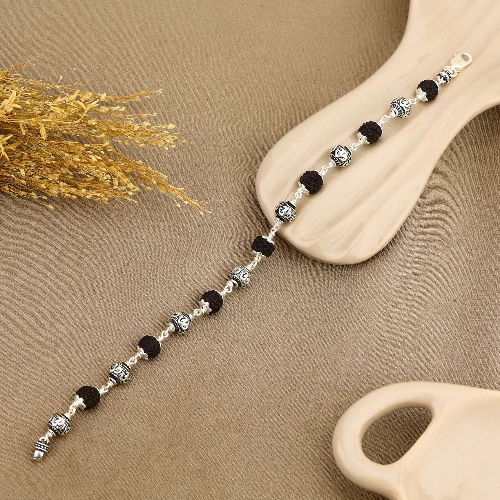 Black Rudraksha with Om Silver Bracelet