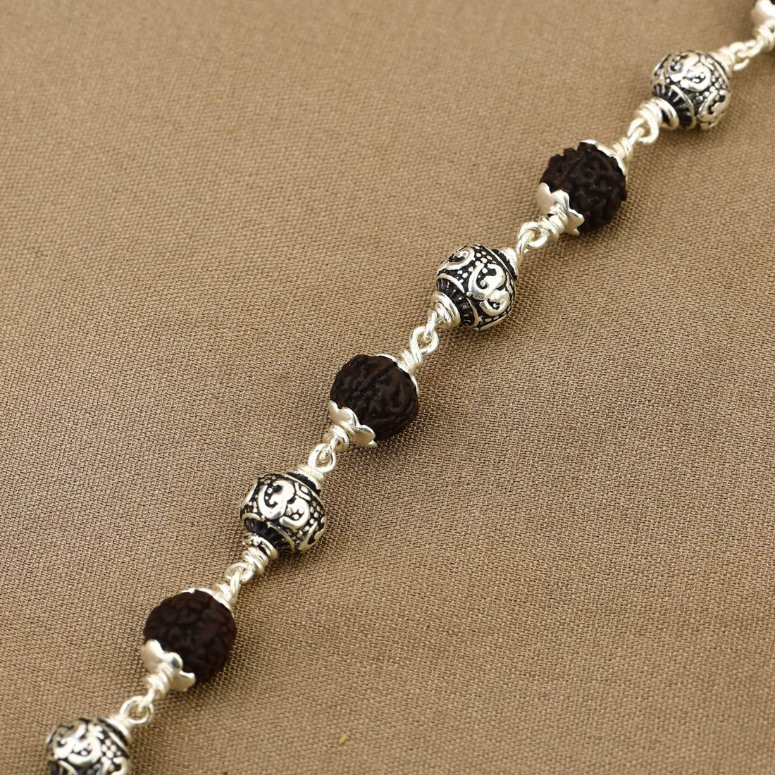 Black Rudraksha with Om Silver Bracelet